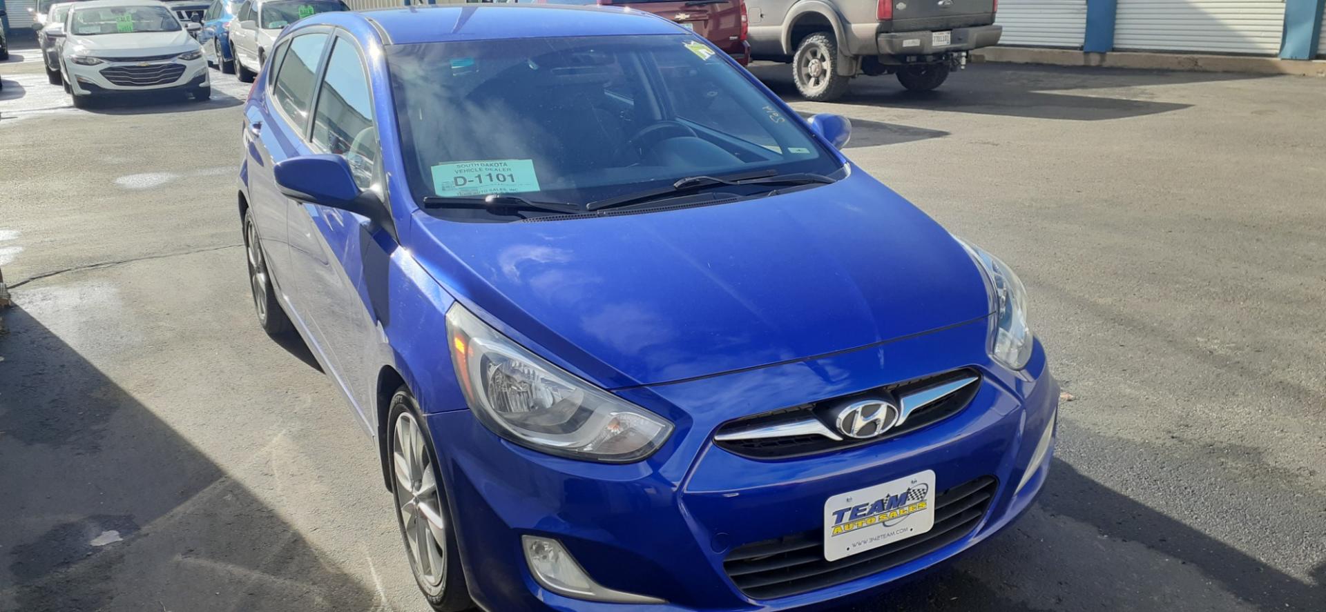 2013 Hyundai Accent SE 5-Door (KMHCU5AE2DU) with an 1.6L L4 DOHC 16V engine, located at 2015 Cambell Street, Rapid City, SD, 57701, (605) 342-8326, 44.066433, -103.191772 - CARFAX AVAILABLE - Photo#4